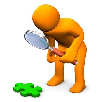 Orange figure trying to figure out a puzzle using a magnifying glass