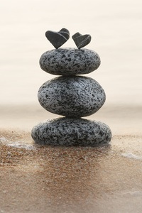 Two hearts atop a pile of stones